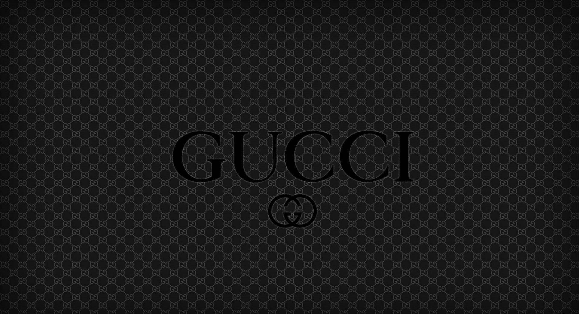 深色字母組合背景上的Gucci標誌 — Gucci GIF 壁紙
