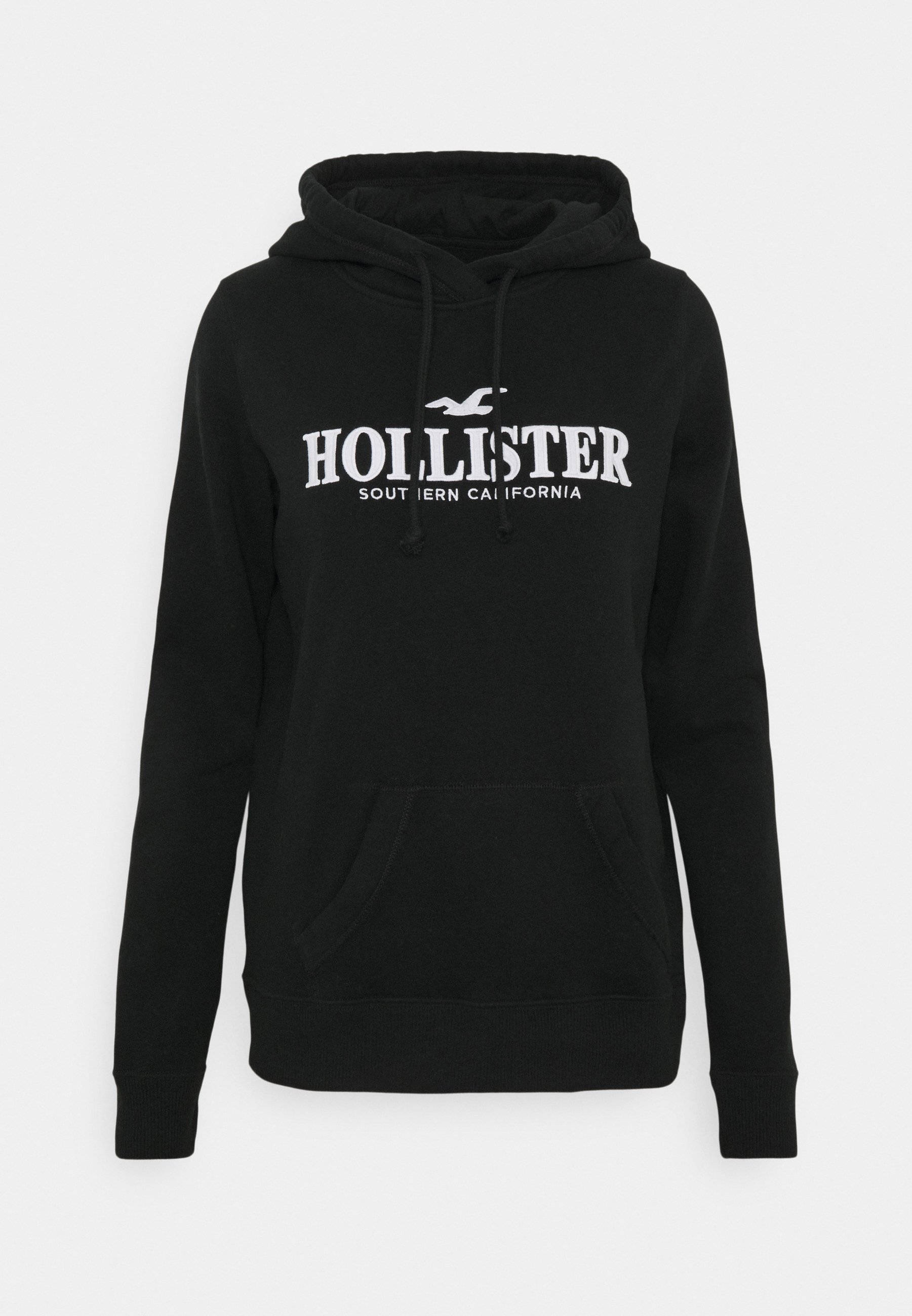Hollister 桌布 壁紙 — 黑色Hollister連帽上衣，帶白色標誌和抽繩，展示在純白色背景上。