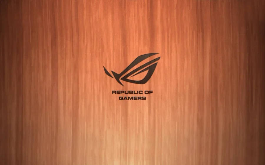 Wood Texture 桌布 壁紙 — 黑色Republic of Gamers標誌居中於溫暖木紋背景上，帶有微妙的漸變照明。