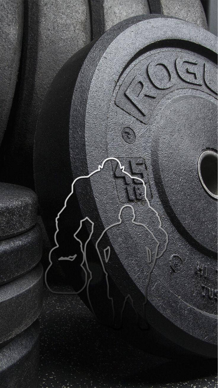 Fitness Motivation iPhone 桌布 壁紙 — 黑色Rogue 45磅槓鈴片的特寫，表面有兩個舉重人物的白色輪廓。