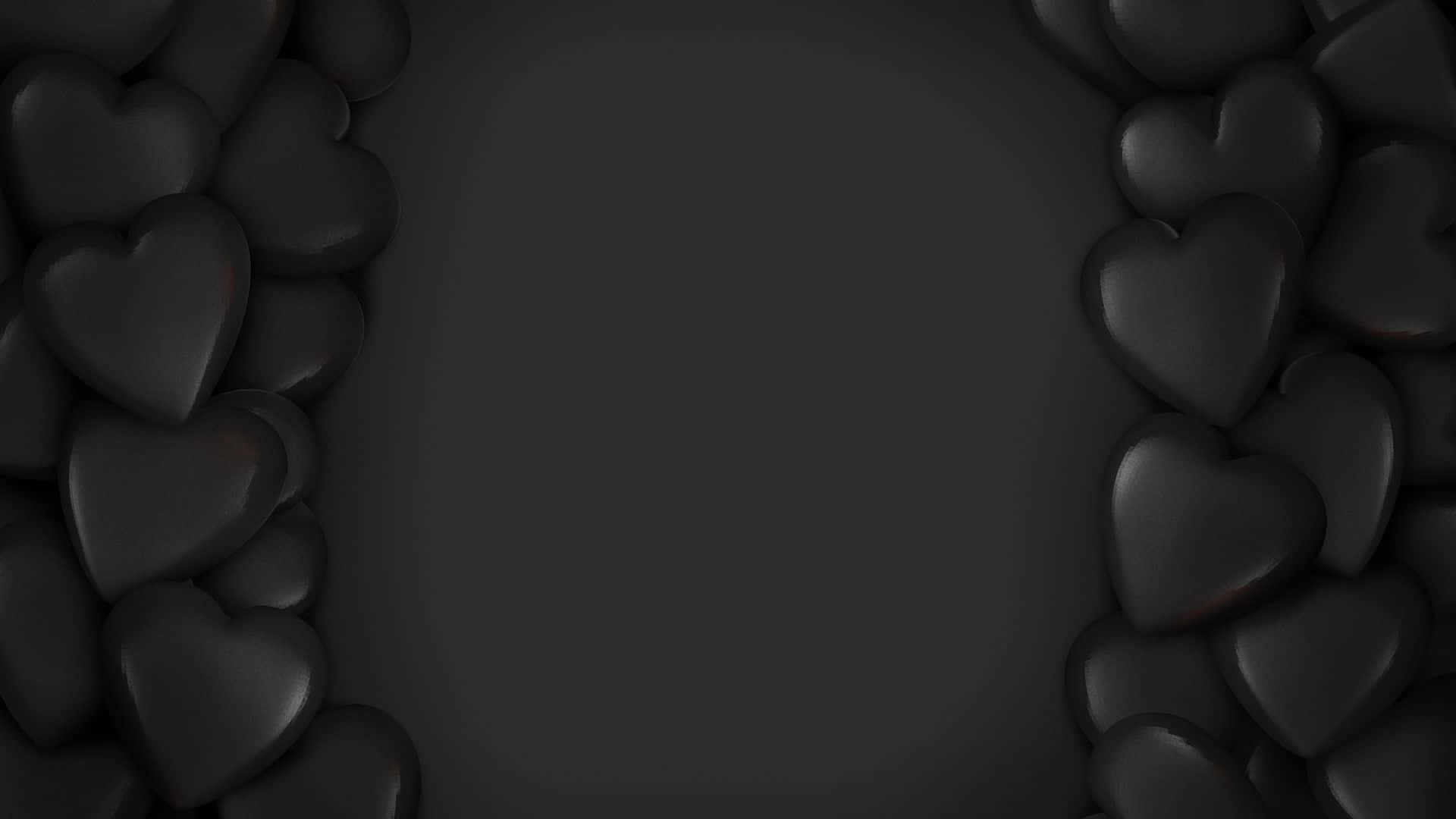 Black Hearts 桌布 壁紙 — 黑色光澤心形圍繞深灰色中心形成邊框，營造出極簡浪漫的框架。