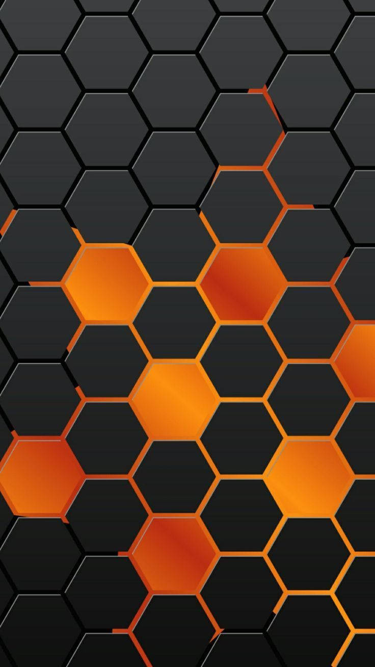 六邊形 桌布 壁紙 — 黑色六邊形搭配發光橙色亮點的時尚圖案，營造出現代科技風格的桌布。