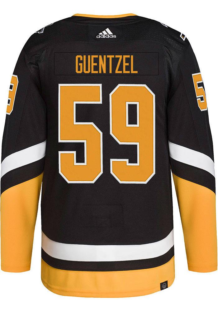hockey 桌布 壁紙 — 黑色冰球球衣，背面有粗體黃色號碼59和名字Guentzel，背景為純白色。