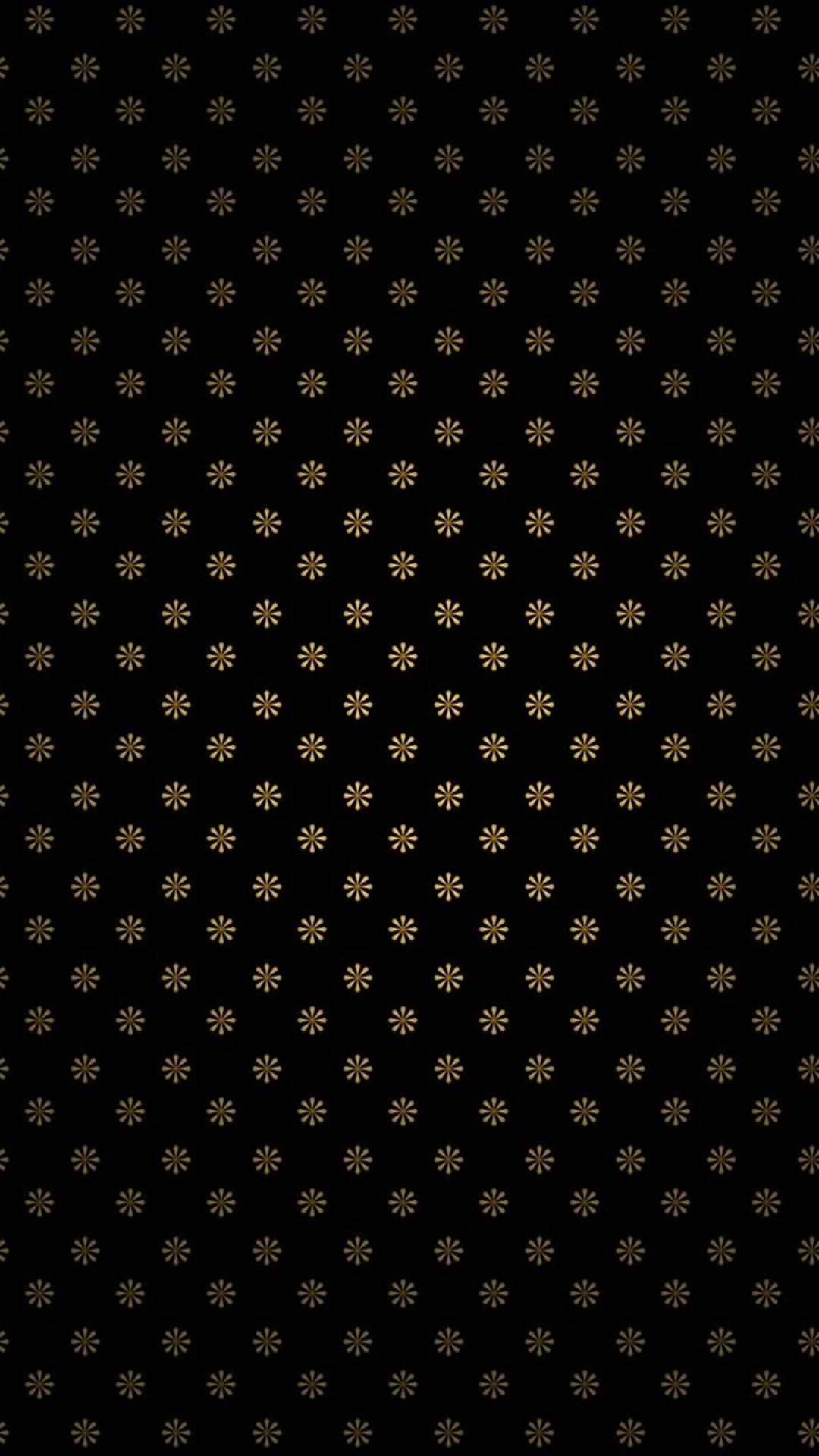 Interesting iPhone 桌布 壁紙 — 黑色壁紙，表面均勻分佈重複的小金色星爆圖案。