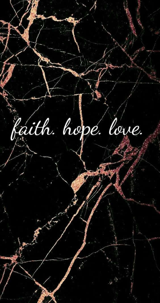 桌布 壁紙 — 黑色大理石搭配金色紋理和白色草書文字，內容為 faith hope love。