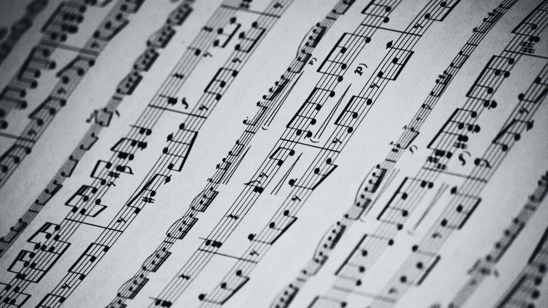 Black And White Music 桌布 壁紙 — 黑色樂譜符號在白紙上的特寫，景深淺，有對角線。