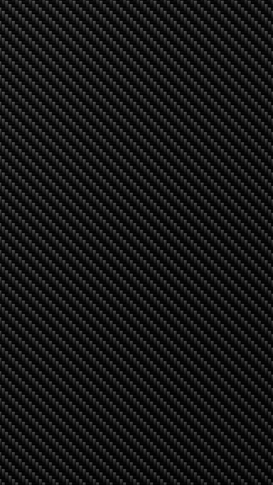 Carbon Fiber iPhone 桌布 壁紙 — 黑色碳纖維紋理特寫，帶有對角編織圖案和微妙光澤。