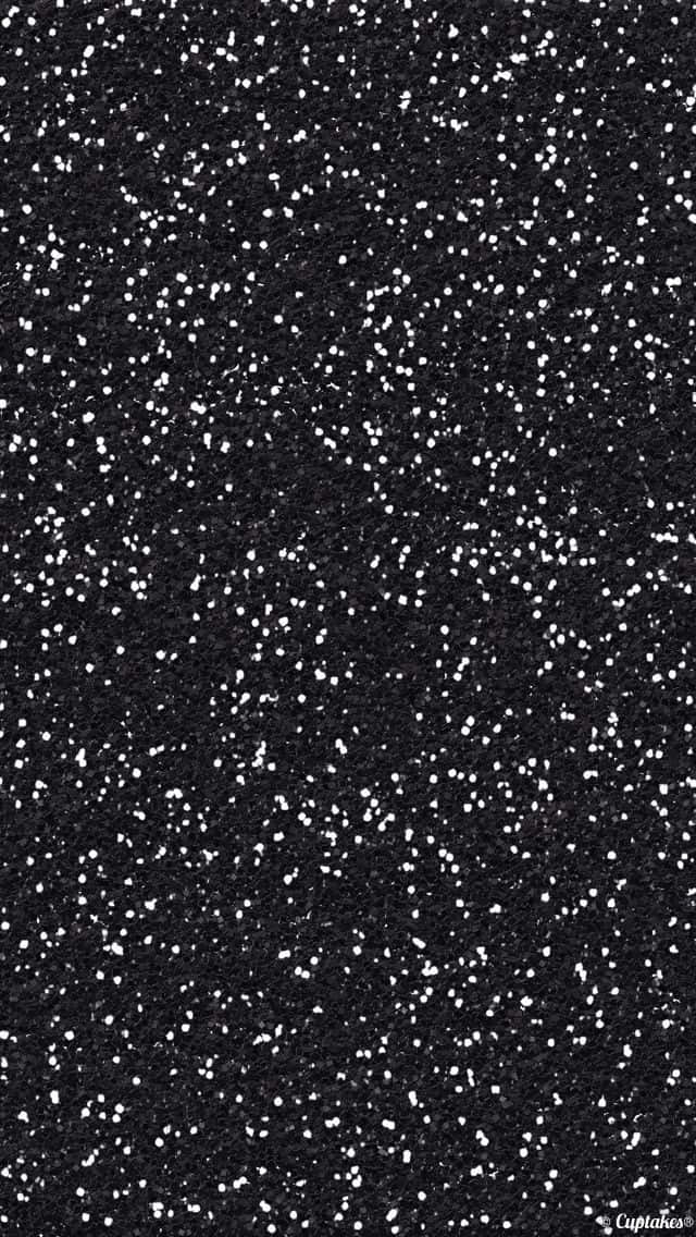 black textured 桌布 壁紙 — 黑色紋理表面特寫，散落著白色亮粉顆粒。