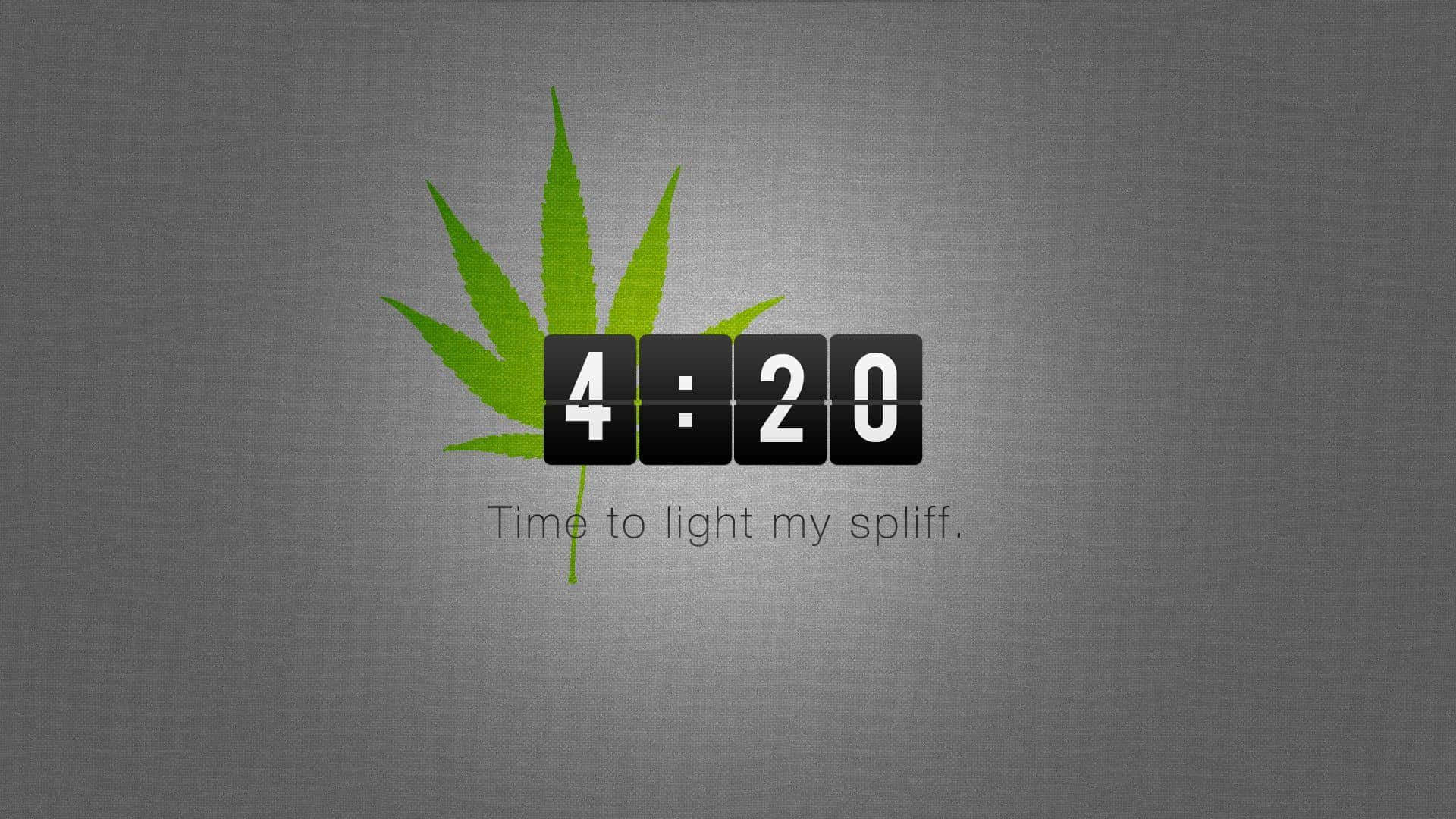 420 桌布 壁紙 — 黑色翻頁時鐘後面的一片綠色大麻葉，時鐘顯示4:20，下方文字為time to light my spliff。