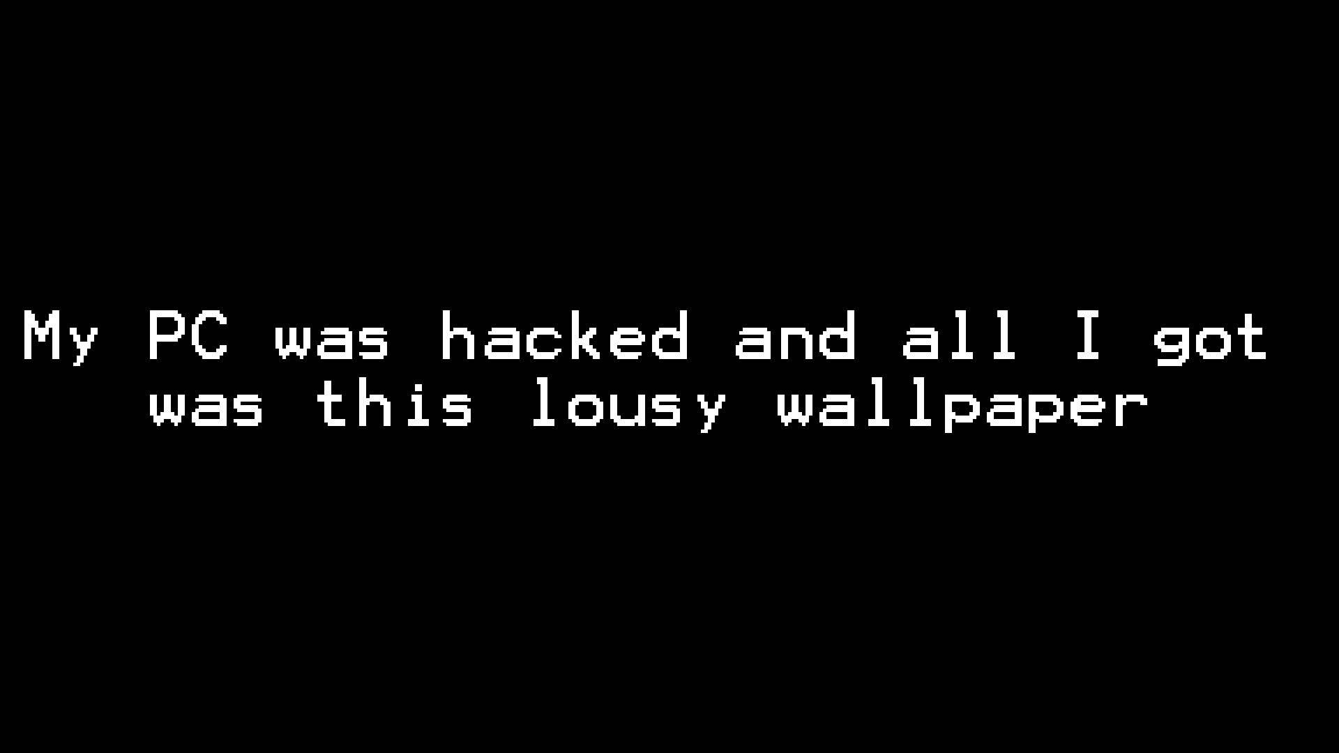 Hacker Full HD 桌布 壁紙 — 黑色背景，白色像素文字寫著「我的電腦被駭客入侵，我得到的只是這個糟糕的桌布」。