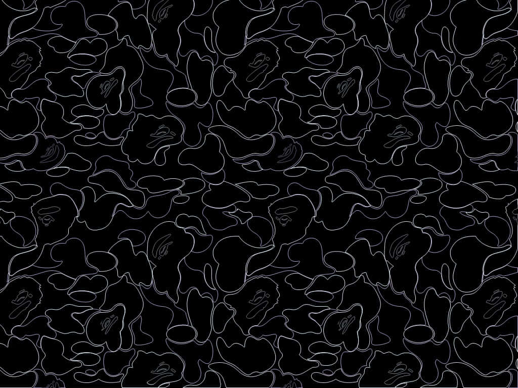 Bape Camo 桌布 壁紙 — 黑色背景，重複填充白色輪廓的BAPE迷彩圖案，帶有風格化的猿頭。