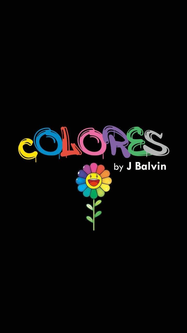 J 桌布 壁紙 — 黑色背景上，彩虹色文字「COLORES」下方有一個微笑的彩虹花。