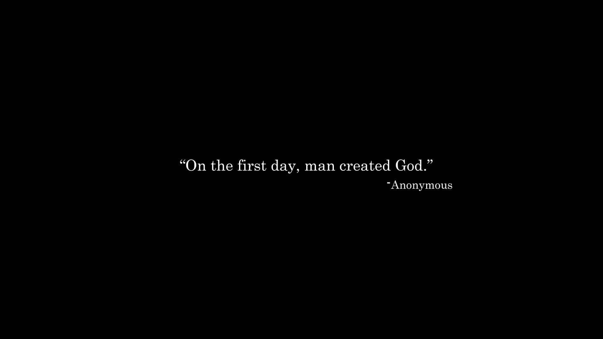 Minimalist Bible 桌布 壁紙 — 黑色背景上以白色文字引用匿名者所說的「第一天，人類創造了上帝。」