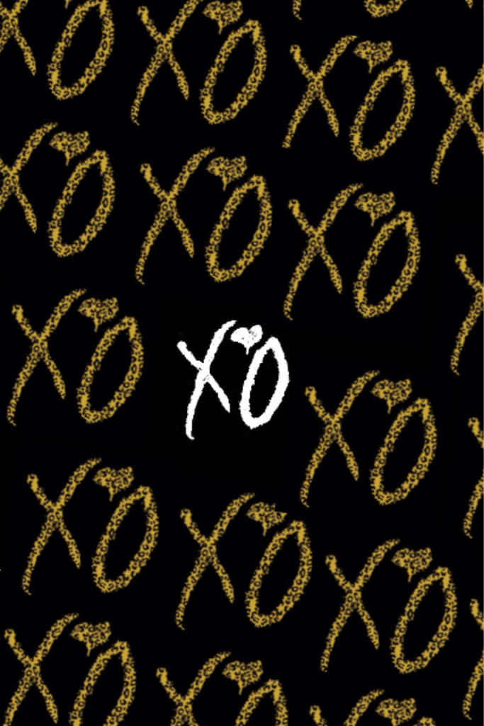 Ovoxo 桌布 壁紙 — 黑色背景上佈滿閃爍金色XO符號，中央有一個白色XO。