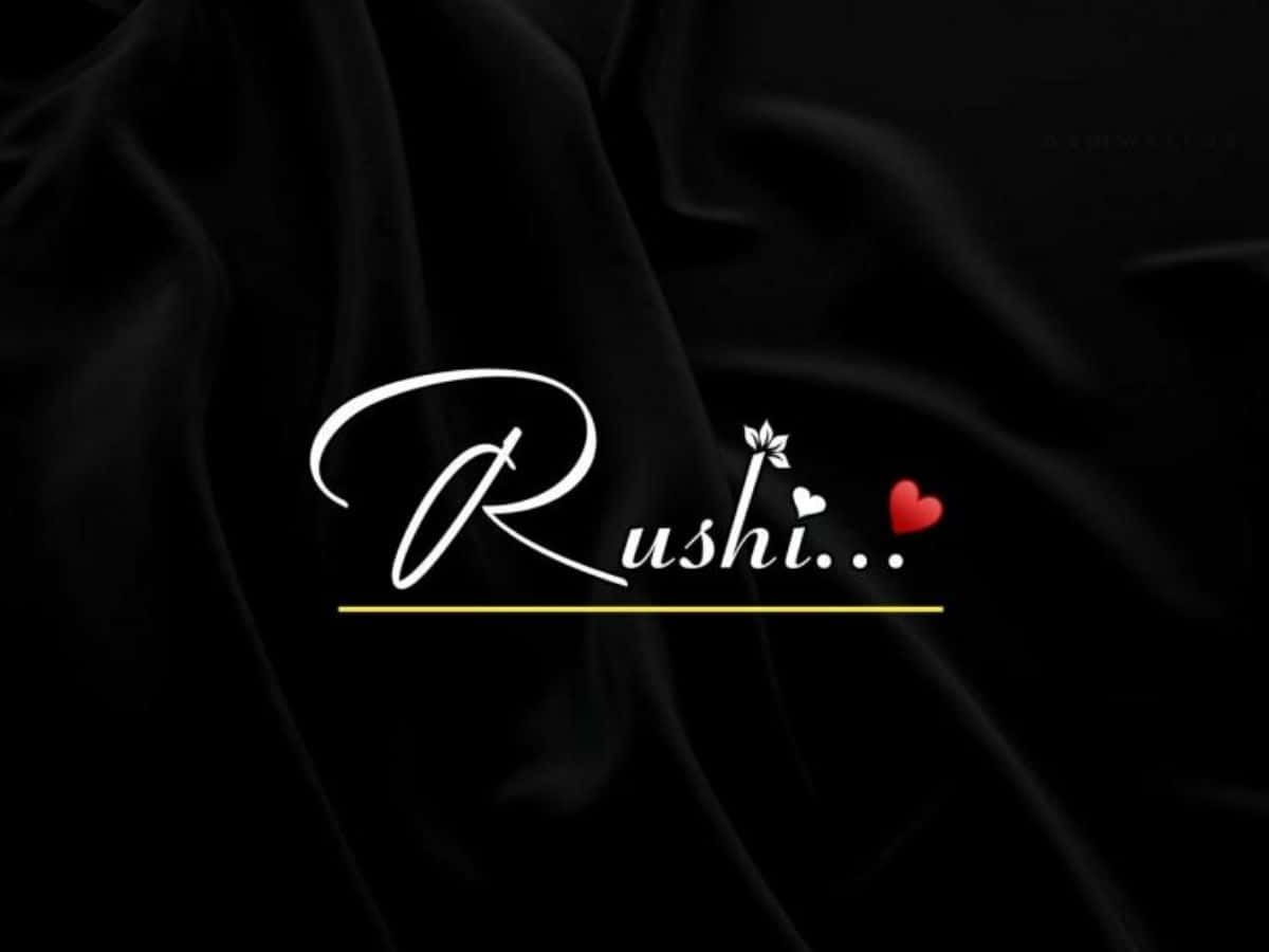 黑色背景上寫著rushi字樣 壁紙