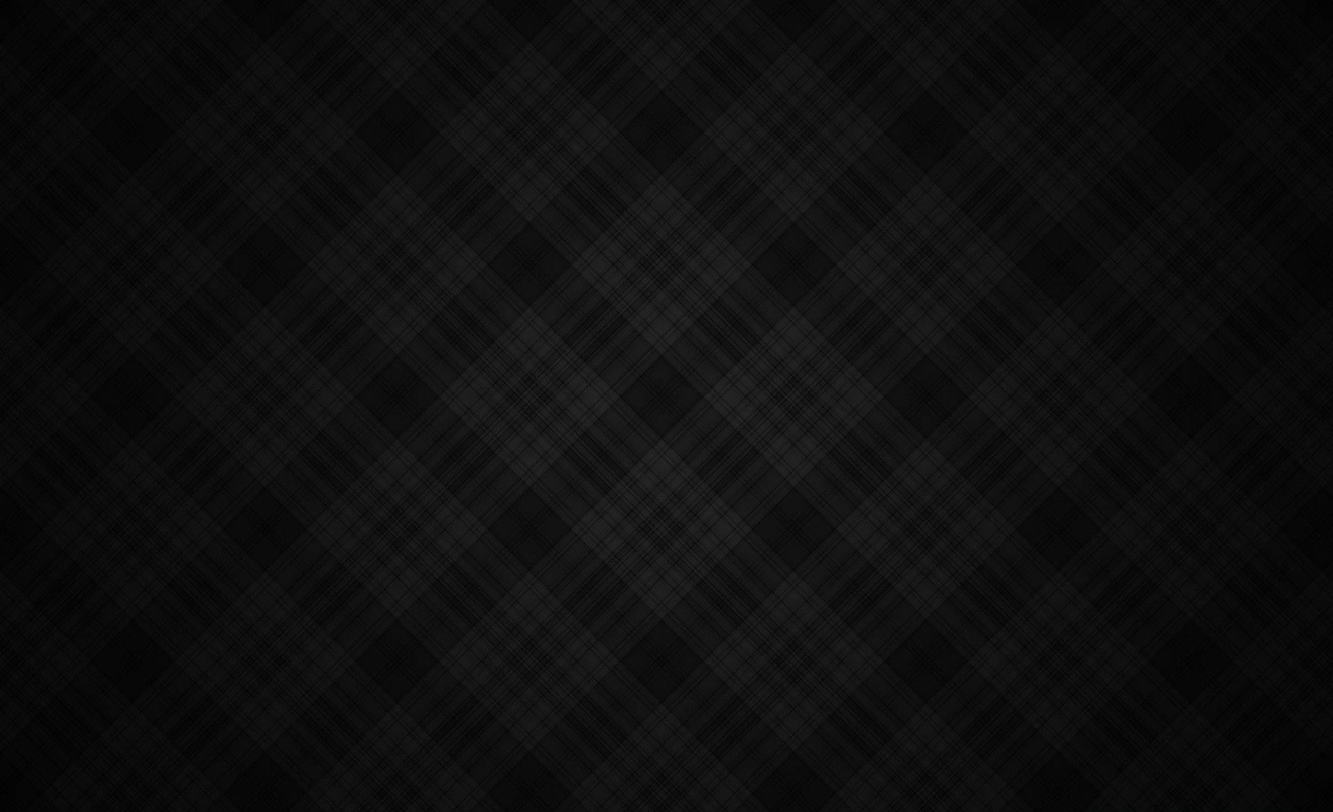 Plaid 桌布 壁紙 — 黑色背景上帶有微妙對角線和漸層陰影的極簡深色格紋圖案。