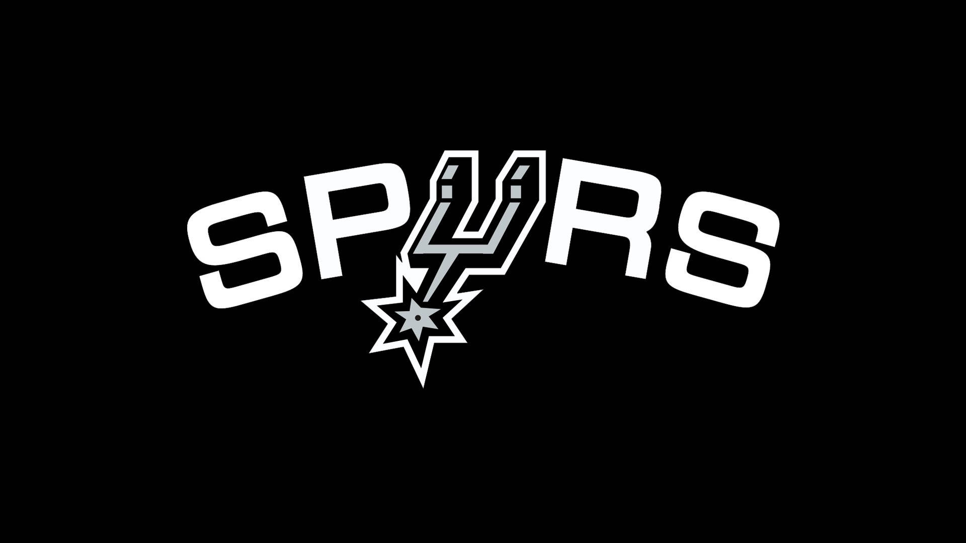 Spurs 桌布 壁紙 — 黑色背景上帶有星星和風格化Y的醒目白色馬刺隊標誌。