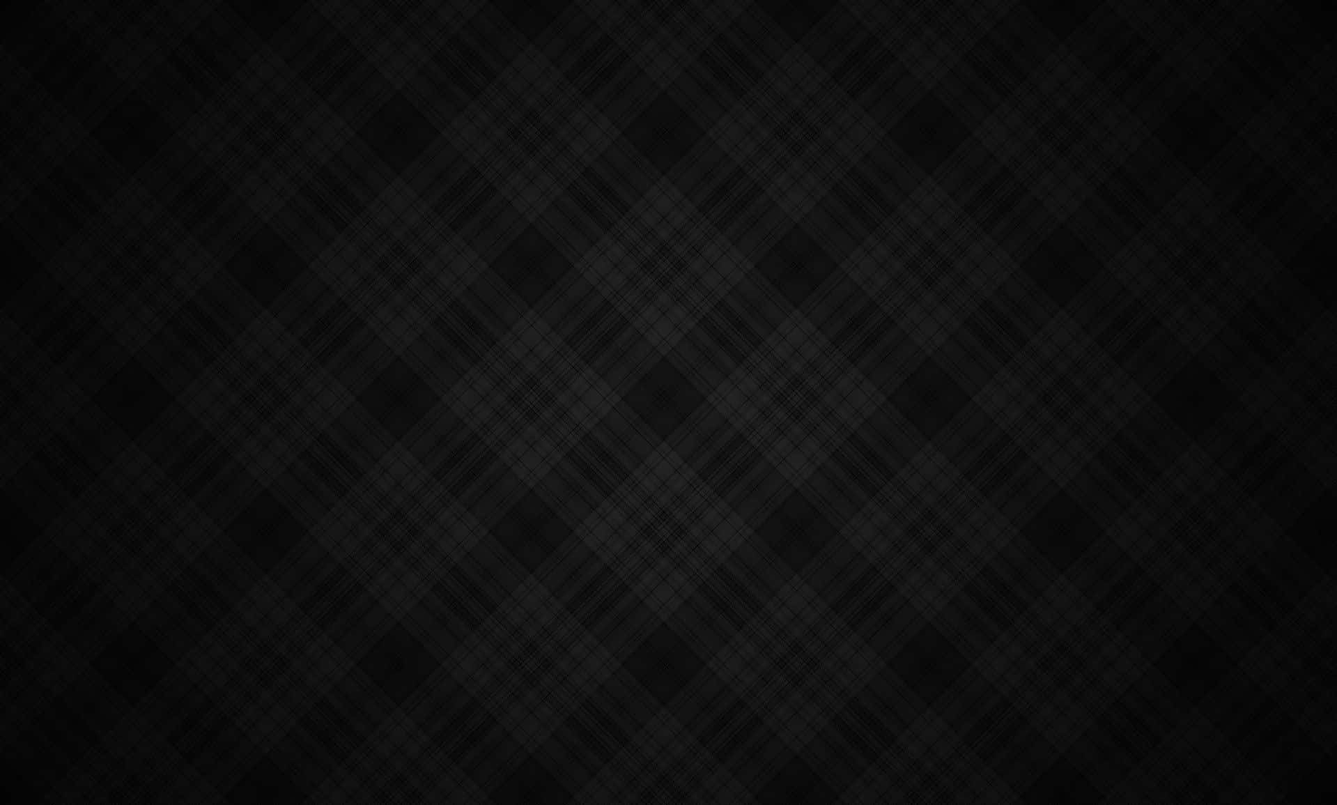 Dark Textured 桌布 壁紙 — 黑色背景上帶有細微灰色線條形成菱形圖案的深色格子紋。