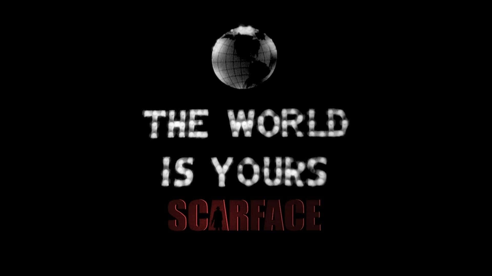Scarface Desktop 桌布 壁紙 — 黑色背景上有一個線框地球儀，下方是粗體文字「THE WORLD IS YOURS」，再下方是紅色的「SCARFACE」。