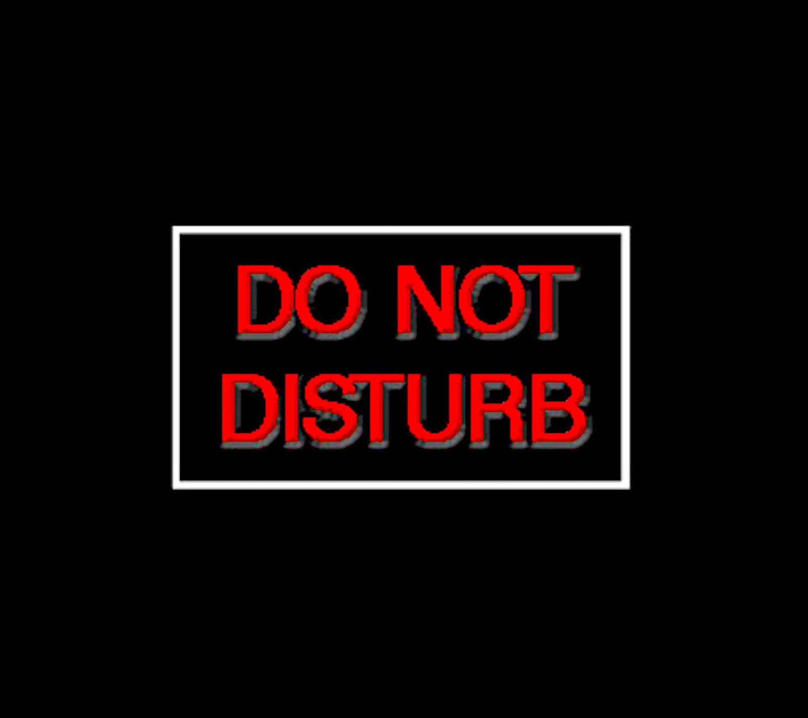 Do Not Disturb 桌布 壁紙 — 黑色背景上白色方框內的粗體紅色「請勿打擾」文字，帶有3D陰影效果。