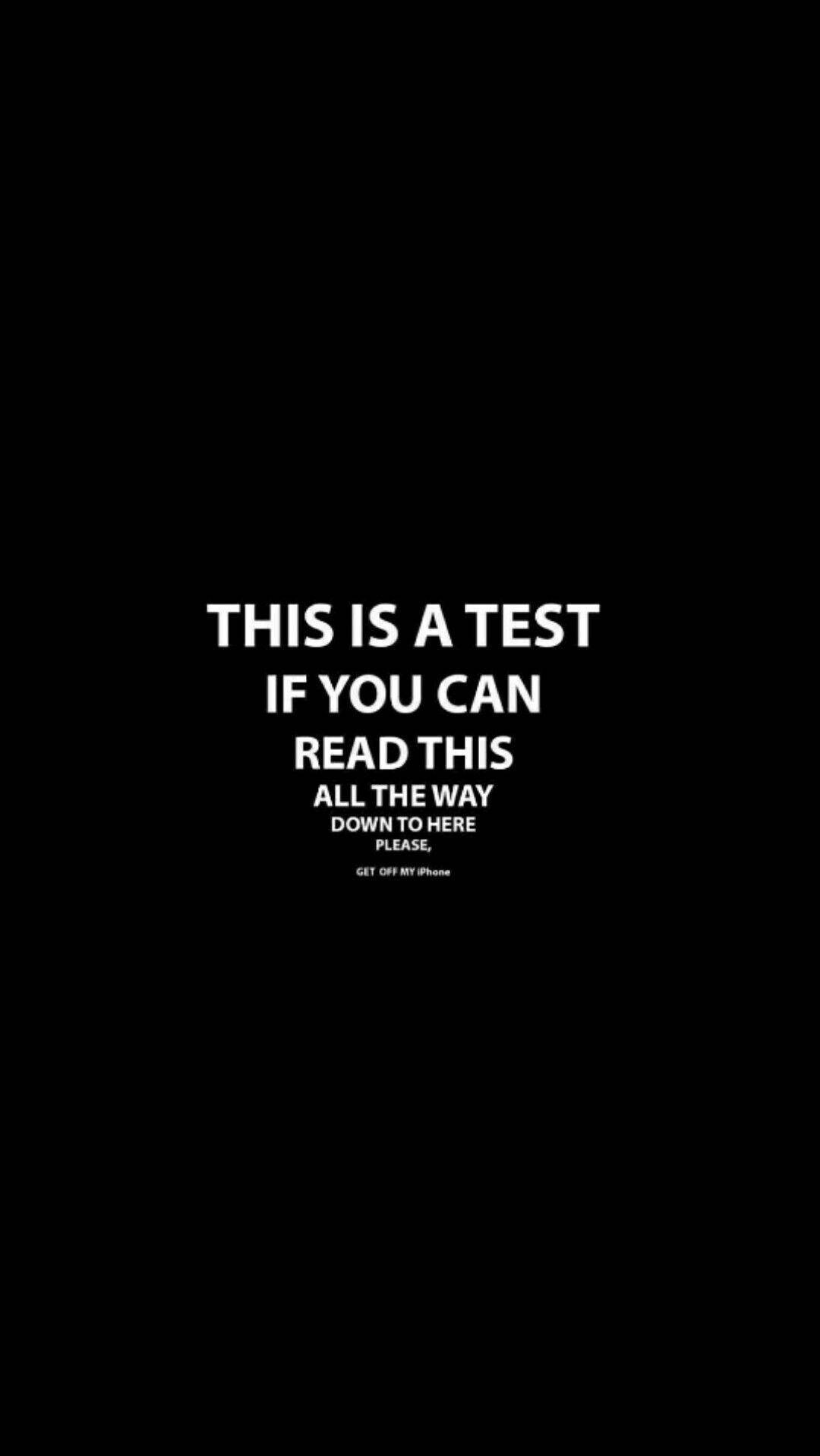 Quote 桌布 壁紙 — 黑色背景上粗體白色文字寫著「THIS IS A TEST IF YOU CAN READ THIS ALL THE WAY DOWN TO HERE PLEASE GET OFF MY IPHONE」