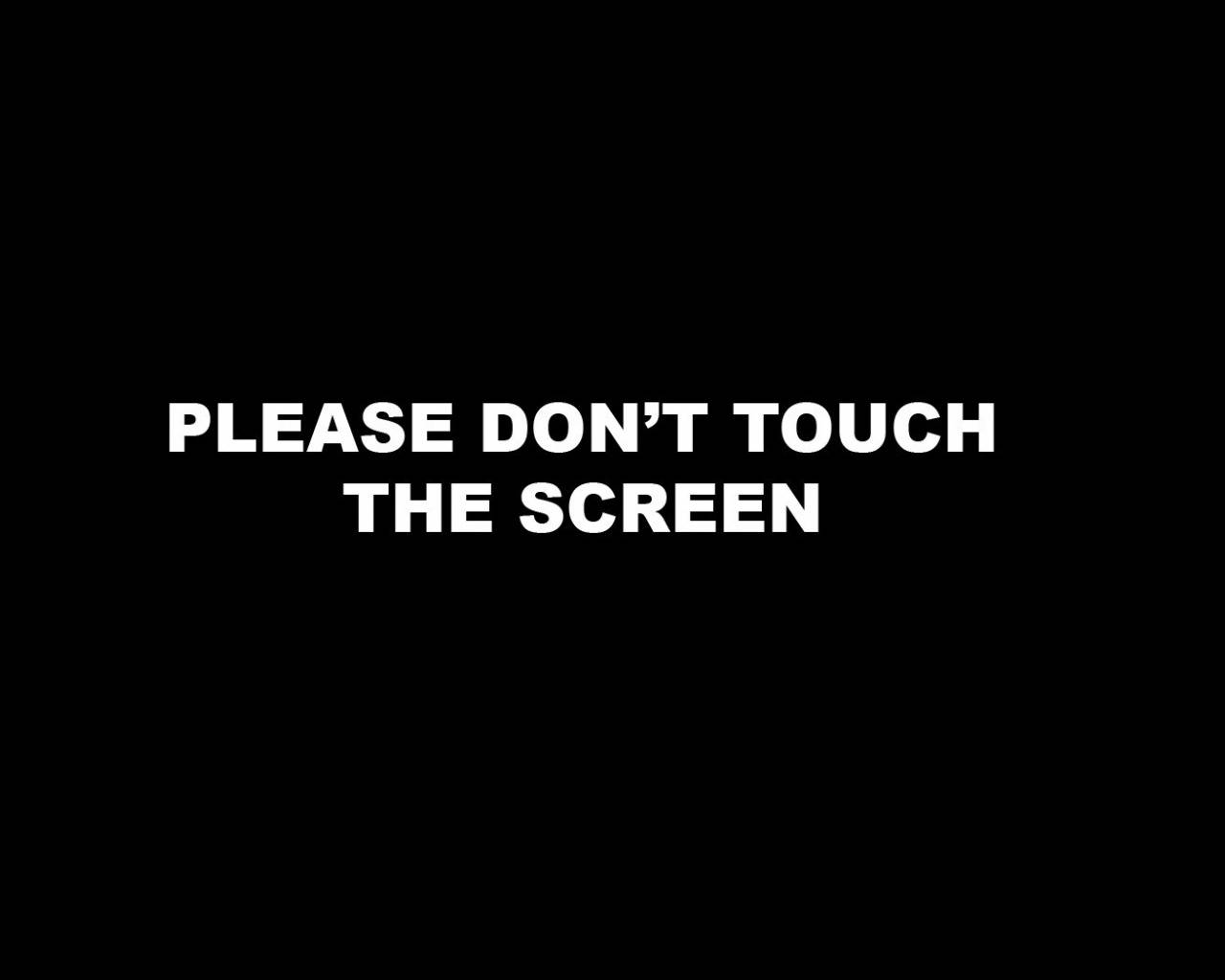 Dont Touch My Computer 桌布 壁紙 — 黑色背景上粗體白色文字寫著：請勿觸碰螢幕。