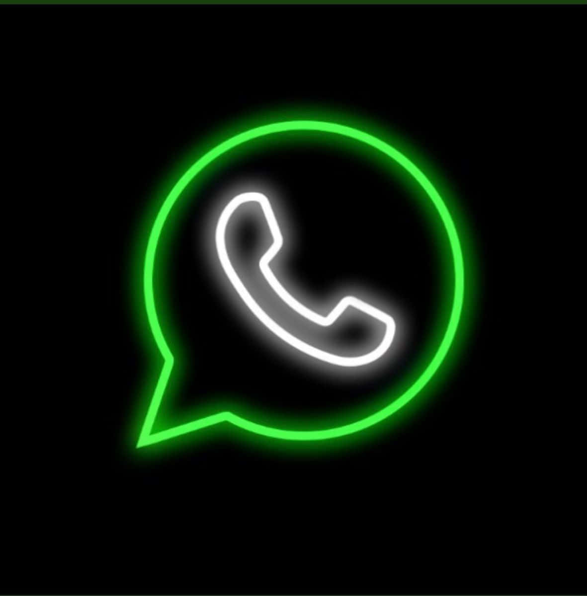 黑色背景上綠色霓虹燈的WhatsApp圖示 壁紙