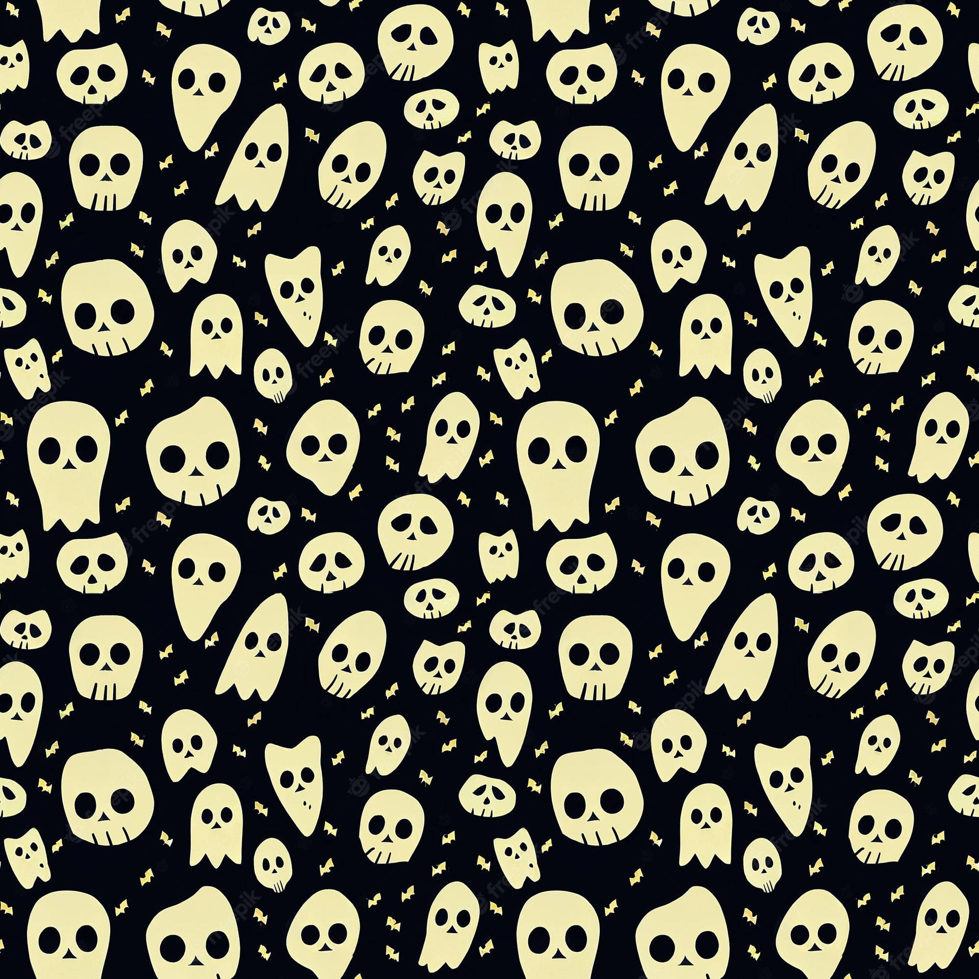 Spooky 桌布 壁紙 — 黑色背景上重複的可愛淡黃色骷髏頭和鬼魂圖案，帶有小蝙蝠。