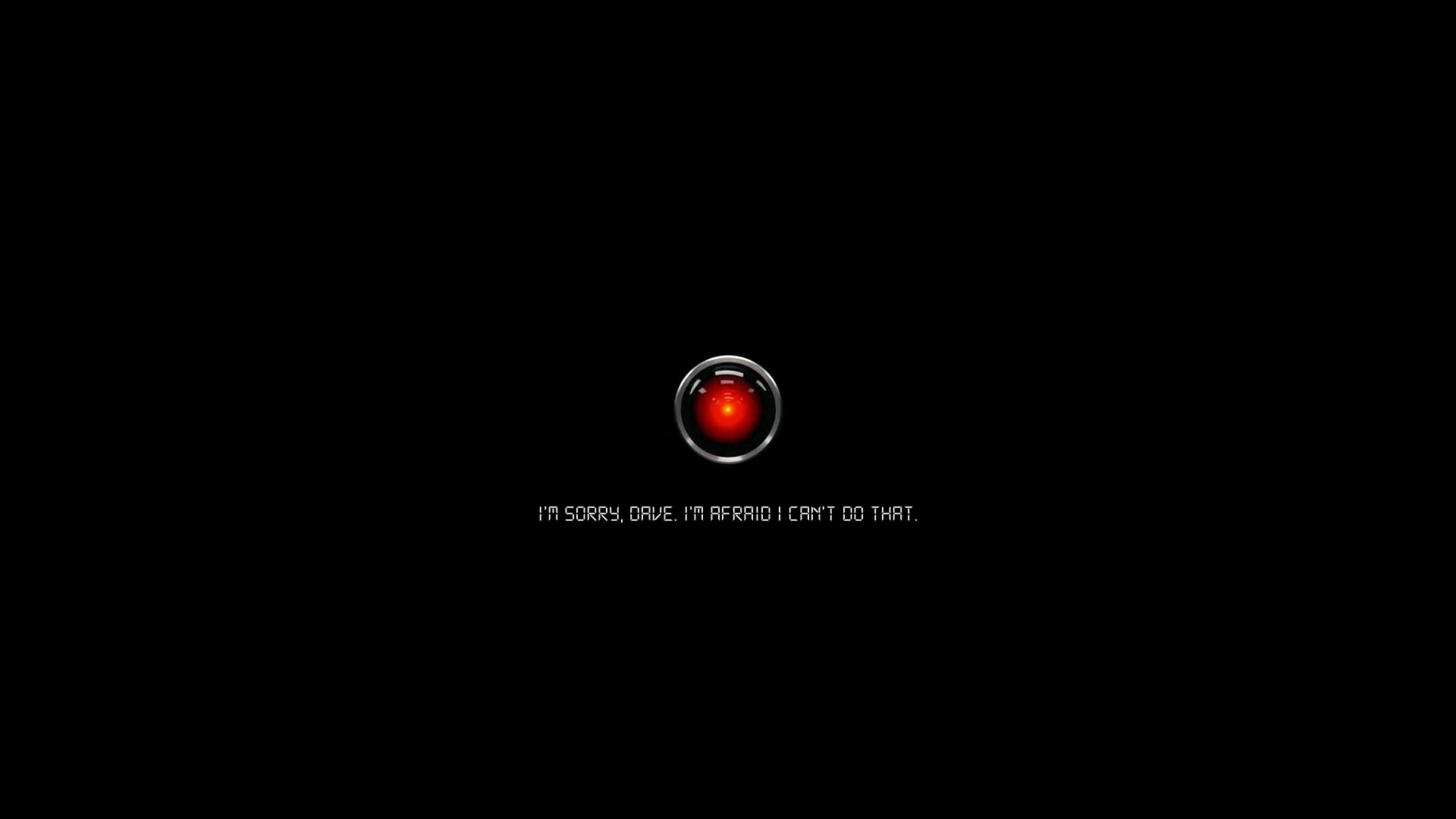 2001 A Space Odyssey 桌布 壁紙 — 黑色虛空中的發光紅色眼睛，上面寫著「對不起 Dave，我恐怕無法那樣做」