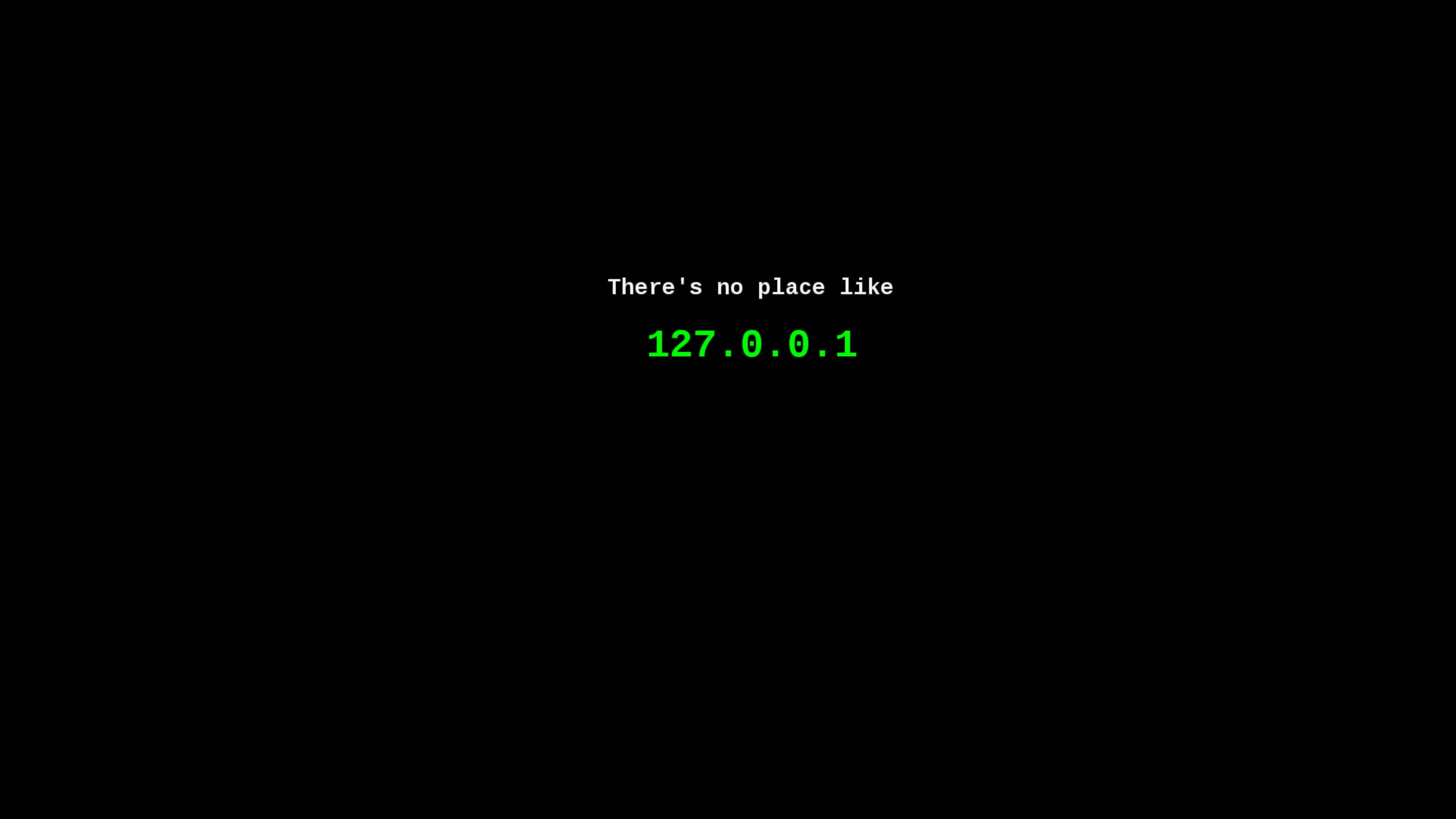駭客 桌布 壁紙 — 黑色螢幕以白色和綠色數位字體顯示文字 'There's no place like 127.0.0.1'。