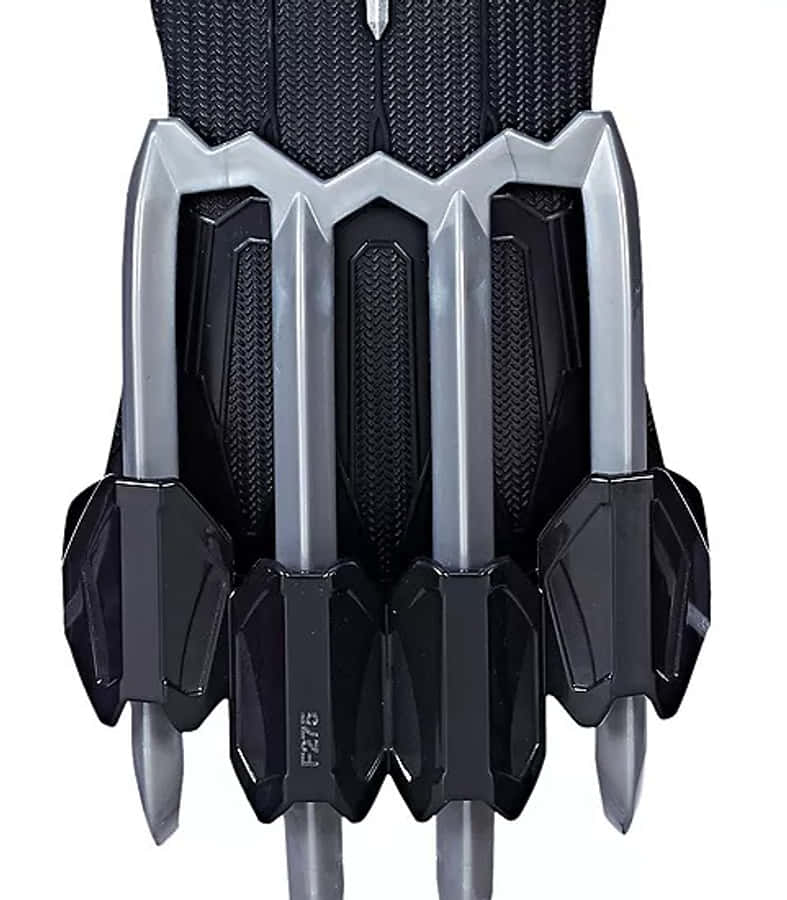 Panther Claws 桌布 壁紙 — 黑銀色亞德曼合金爪手套的特寫，鋒利的金屬刀片從指關節伸出。