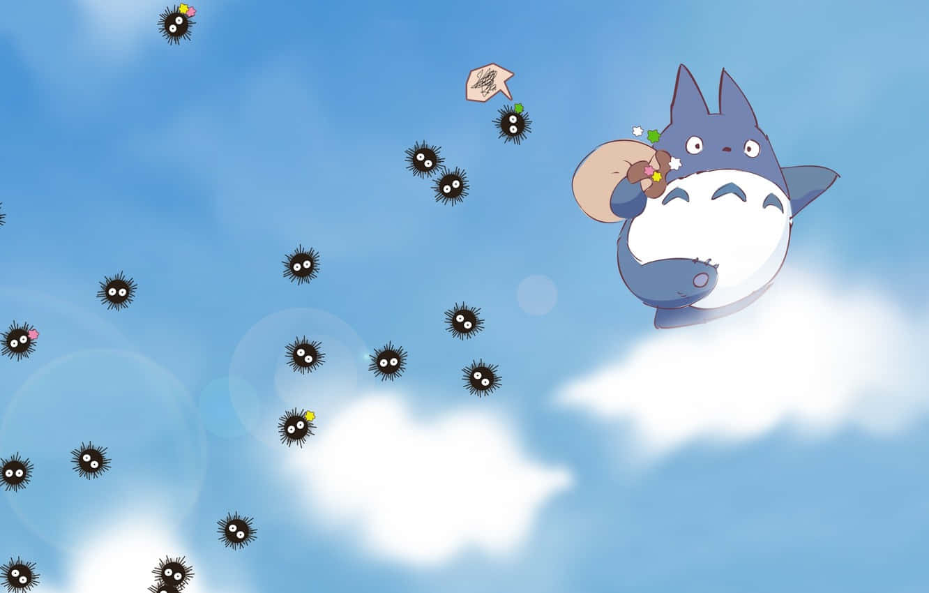 龍貓在明亮的藍天中與灰塵精靈一起飛在雲上。 — 龍貓 GIF 壁紙