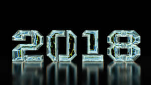 玻璃塊拼出2018，內部有裂紋和反射，置於黑色表面。 — 新年快樂 2020 壁紙