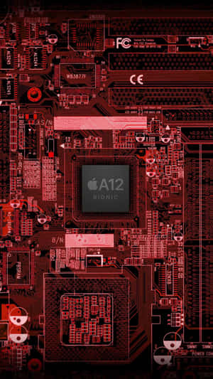 iPhone A12 Bionic 晶片電路板的紅色調特寫。 — 電路板 壁紙