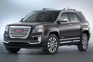 霧面黑色GMC Acadia SUV在攝影棚燈光下，帶有鍍鉻飾邊。 — 凱迪拉克 壁紙