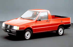 攝影棚中的紅色飛雅特 Fiorino 皮卡車 — 飛雅特 壁紙