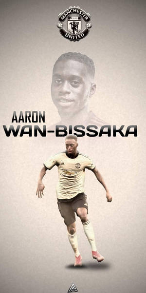Aaron Wan-Bissaka 身穿曼聯足球球衣奔跑。 — 運動 壁紙