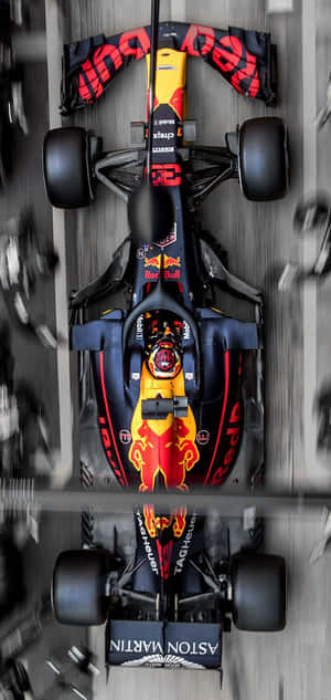 從上方俯瞰 Red Bull F1 賽車，帶有動態模糊和反光效果。 — 諾基亞 壁紙