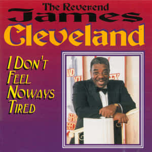Reverend James Cleveland 穿著燕尾服在帶有紫色和黃色文字的專輯封面上微笑。 — 音樂 壁紙
