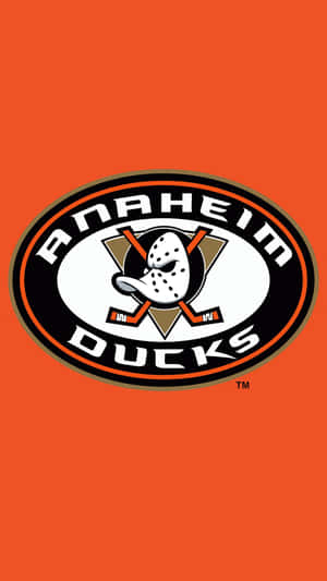 橙色背景上的 Anaheim Ducks 冰球隊標誌 — 安納海姆鴨隊 壁紙