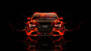 Audi 汽車在黑色反射表面上帶有熾熱的橙色火焰。 — 奧迪 GIF 壁紙