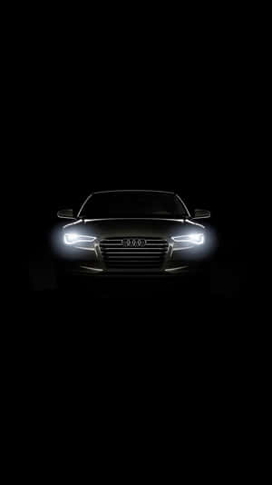 Audi 車頭燈在黑暗中發光。 — 奧迪 GIF 壁紙