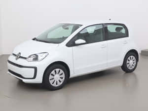 白色Volkswagen up!小型房車在攝影棚中 — 福斯汽車 壁紙