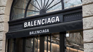 Balenciaga 時裝店入口，黑色招牌和石頭外牆。 — 巴黎世家 壁紙
