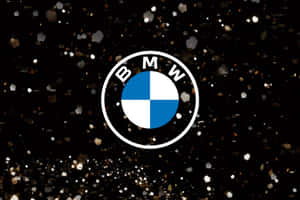 黑色背景上帶有亮粉粒子的 BMW 標誌 — Mercedes-Benz 壁紙
