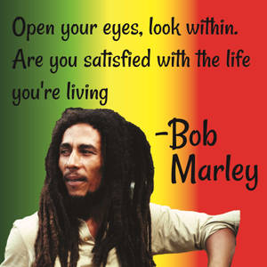 Bob Marley 在拉斯塔旗幟背景上附有引言 — 巴布·馬利語錄 壁紙