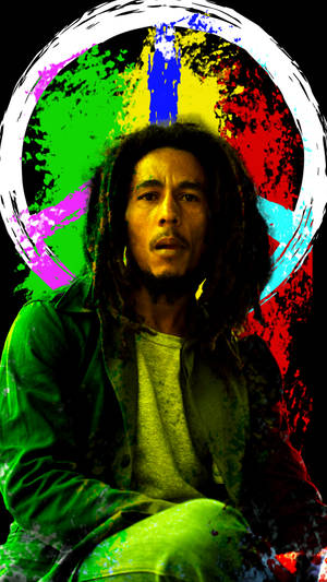 Bob Marley 留著辮子頭，站在色彩繽紛的和平標誌圖案前。 — 巴布·馬利語錄 壁紙