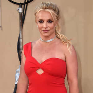 Britney Spears 在正式活動中穿著紅色連衣裙和鑽石頸鍊。 — 小甜甜布蘭妮 壁紙