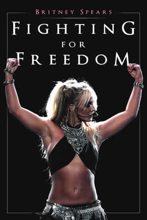 Britney Spears 為其專輯《Fighting for Freedom》封面擺出強而有力的姿勢，高舉拳頭。 — 小甜甜布蘭妮 壁紙