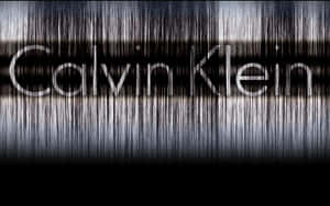 Calvin Klein 標誌在拉絲金屬紋理和黑色漸變背景上。 — 卡文克萊 壁紙